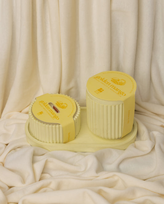 Vela aromatica con base de concreto golden mango